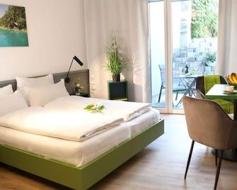 Studio S Balkon - City Appartements Villach - Villach - Chambre