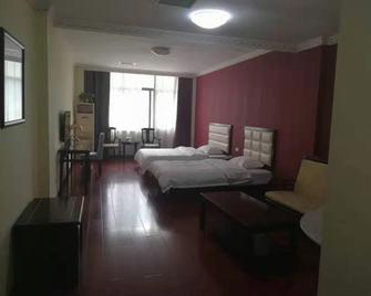 Baligou Hotel - Xinxiang - Спальня