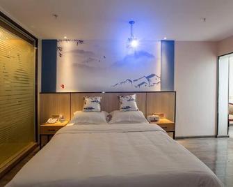 Sovereign Bamboo House Hotel (Suining North Binjiang Road) - Suining - Schlafzimmer