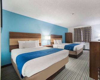 Ramada by Wyndham Effingham - Effingham - Schlafzimmer