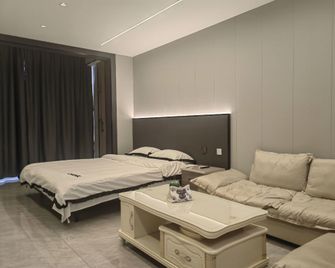 Luming Boutique Hotel Apartment (Hengda Branch) - Fu-šun - Ložnice