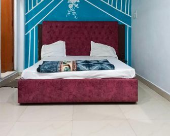 Dharma palace - Prayagraj - Schlafzimmer