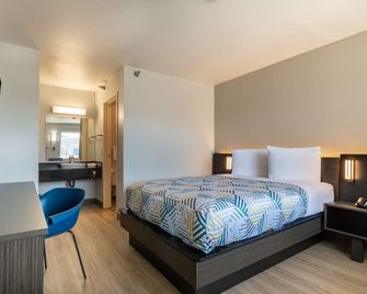 موتل 6 رولنج ميدوز، إلينوي - شيكاجو - نورث ويست - رولينغ ميادووس - غرفة نوم