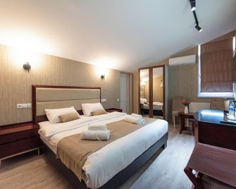 Kraveli Hotel - Tiflis - Schlafzimmer