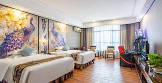 Jinyayu Hotel (Foshan Fengchi Aluminium Material Market Branch) - Foshan - Bedroom