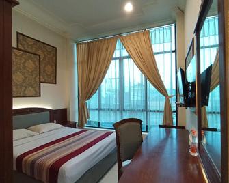 Grand Larisae Hotel - Surakarta - Slaapkamer