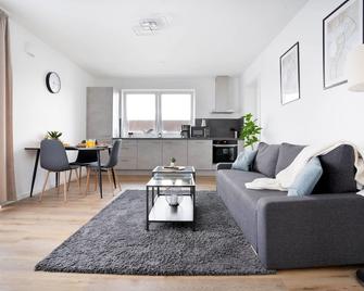 Moderne Apartments im Herzen von Osnabrück I private Tiefgarage I home2share - Osnabrück - Wohnzimmer