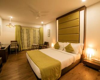 Hotel Shree Aaradhy - Udždžain - Ložnice