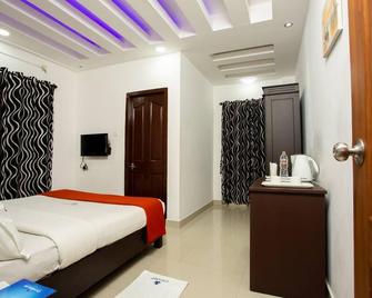 Chandana Inn - Guruvayoor - Schlafzimmer