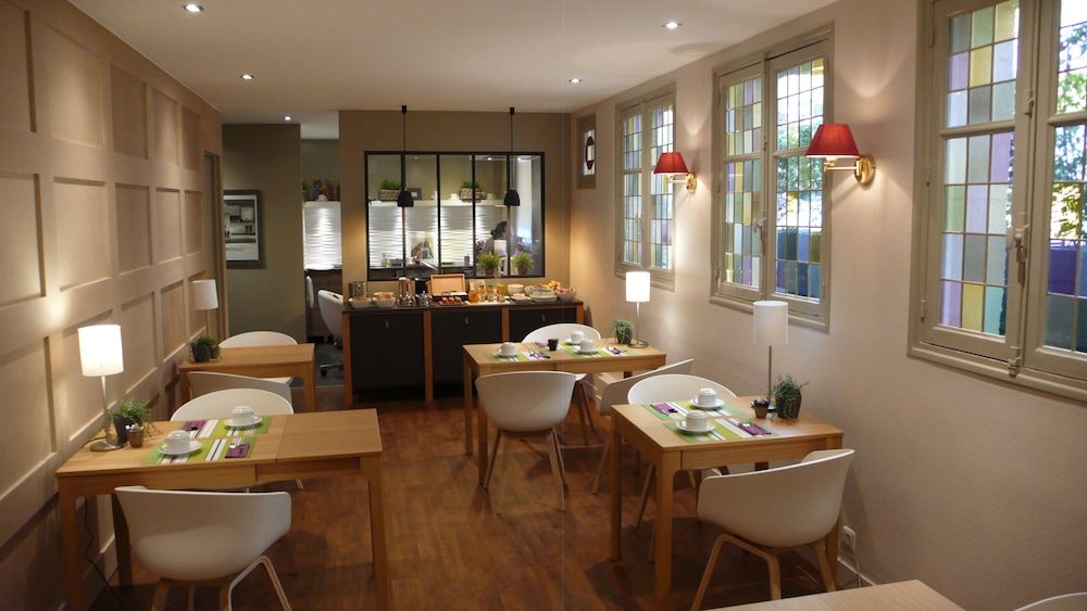 Hôtel Cardinal - רואה - מסעדה