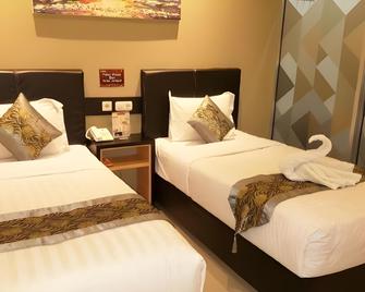 Sunrise Hotel Jogja - Depok - Habitación