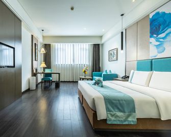 Xana Lite Hotel (Zigong Bus Terminal) - Zigong - Bedroom