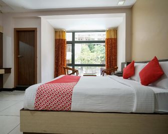 Oyo 8588 Rainbow Inn - Munnar - Bedroom