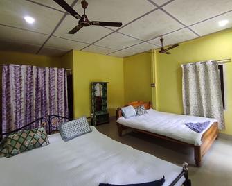 Homecation Dalvi Cottage - Barpeta - Bedroom