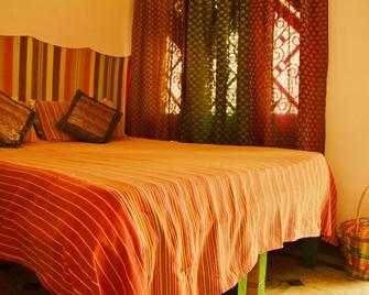 Gostops Lite Varanasi - Varanasi - Camera da letto