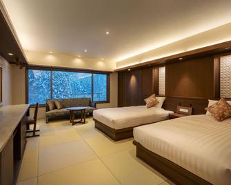 زاو أونسين زاو شيكي نو هوتل - ياماجاتا - غرفة نوم