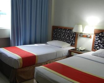 Borneo Hotel - Lawas - Bedroom