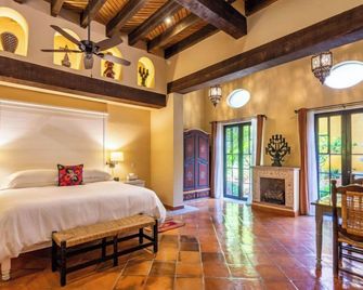 Antigua Capilla B&B - סן מיגל דה איינדה - חדר שינה