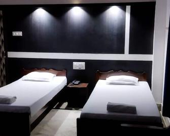 Hotel President - Jorhāt - Bedroom