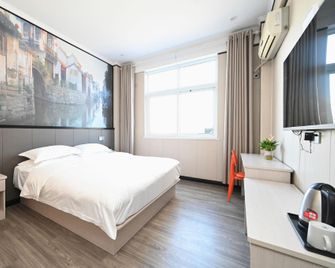 Lezhu Internet Esports Hotel (Pangdonglai Branch) - Xinxiang - Slaapkamer