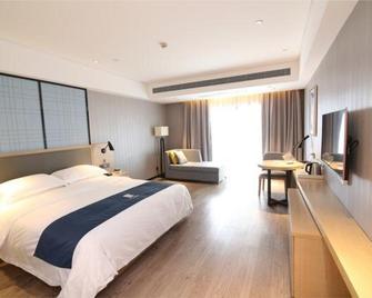 Echarm Hotel Changde Chaoyang D5 District - Changde - Slaapkamer