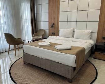 Pars Palas Hotel - ואן - חדר שינה