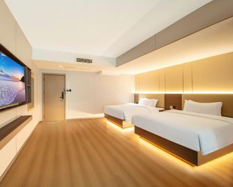 Jinji Manju Hotel (Guangyuan High-speed Railway Station Branch) - Guangyuan - Bedroom