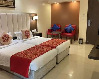 Hotel Ganpat Grand Palani - Palani - Habitación