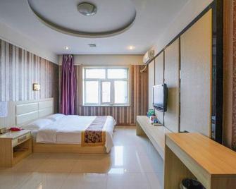 Wolong Hotel - Qiqihar - Habitación