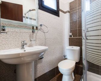 Greco - Koropi - Baño