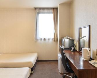 Business Hotel Yagi - Kitaakita - Slaapkamer