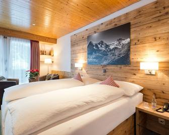 Hotel Bernerhof Grindelwald - גרינדלוואלד - חדר שינה