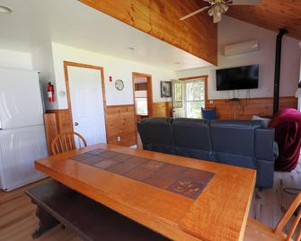 Modern lakefront home on Lake Waukewan with spectacular fall folliage views! - Meredith - Living room
