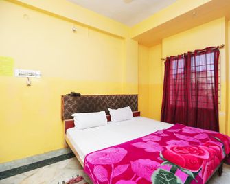 Hotel Savitri - Deoghar - Slaapkamer