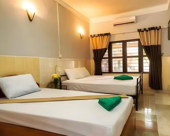 The Billabong Guesthouse - Kampot - Schlafzimmer