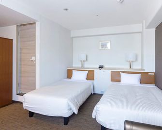 هوتل وينجبورت - ناغاساكي - غرفة نوم