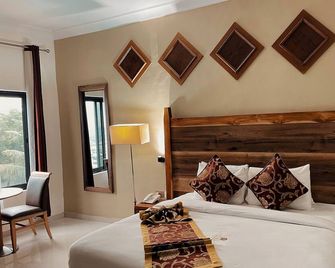 African Hill Hotel & Resort - Ho - Bedroom