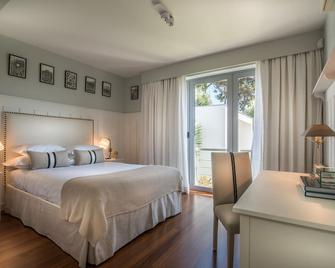 Villa Orange Charm Guesthouse - Cascais - Schlafzimmer