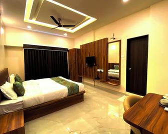 The Grand Sarovar Inn And Suites - Chākan - Habitación