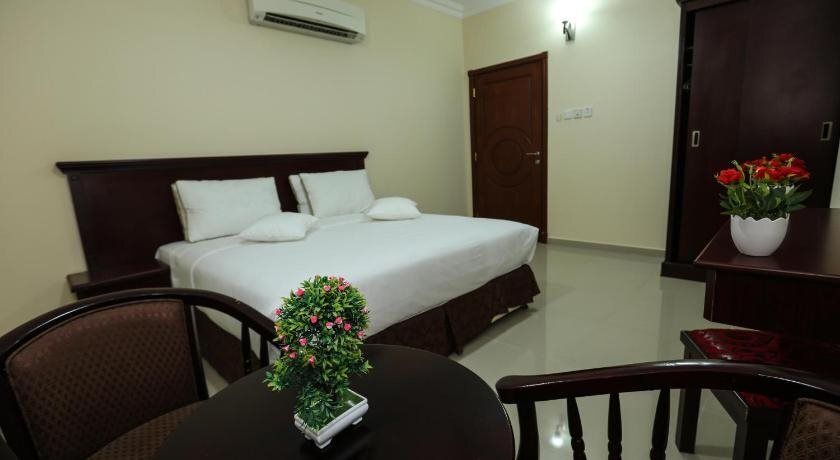 Jarzez Hotel Apartments - Seeb - Schlafzimmer