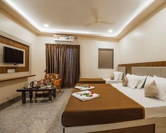 Hotel Sitara Inn - Ratnagiri - Ložnice