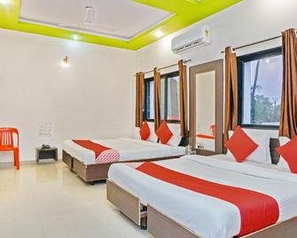 Hotel O Shirdi Sai Inn - Shirdi - Slaapkamer
