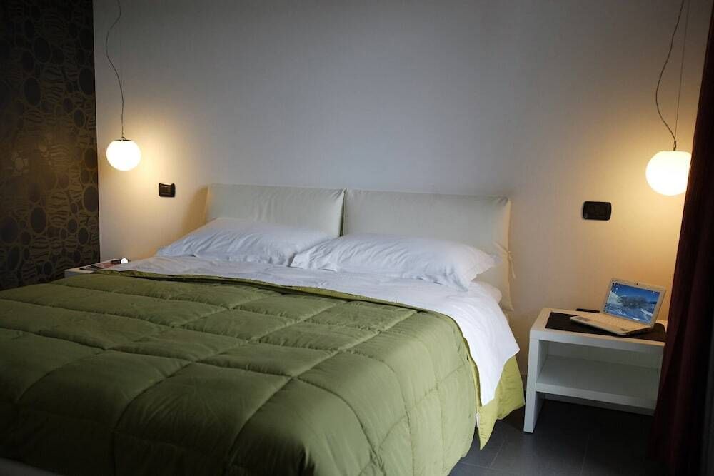 Le Formiche - ميلاتسو - غرفة نوم