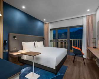 هوليداي إن إكسبرس نانجينج هابي فالاي باي آيتش جي - نانجينغ - غرفة نوم