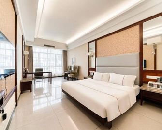 Qianshang Hotel - Dongying - Bedroom