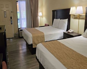 Travelodge by Wyndham Knoxville East - Knoxville - Bedroom