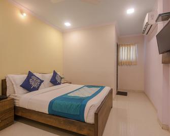 Hotel O Stayland - Mumbai - Bedroom