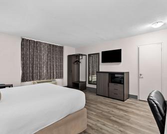 SureStay Plus by Best Western Windsor - ווינדזור - חדר שינה