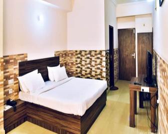 Hotel Corporate Vila - Jammu - Slaapkamer