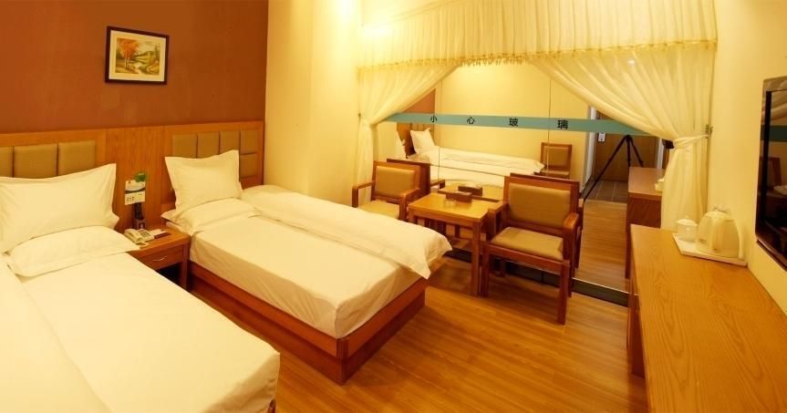 Baoxin Business Hotel - גואנגג'ואו - חדר שינה